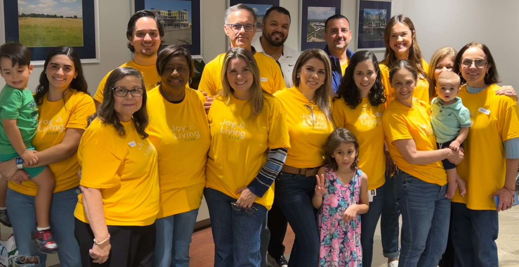 Joy of Living Club volunteers in yellow shirts at the October senior brunch
